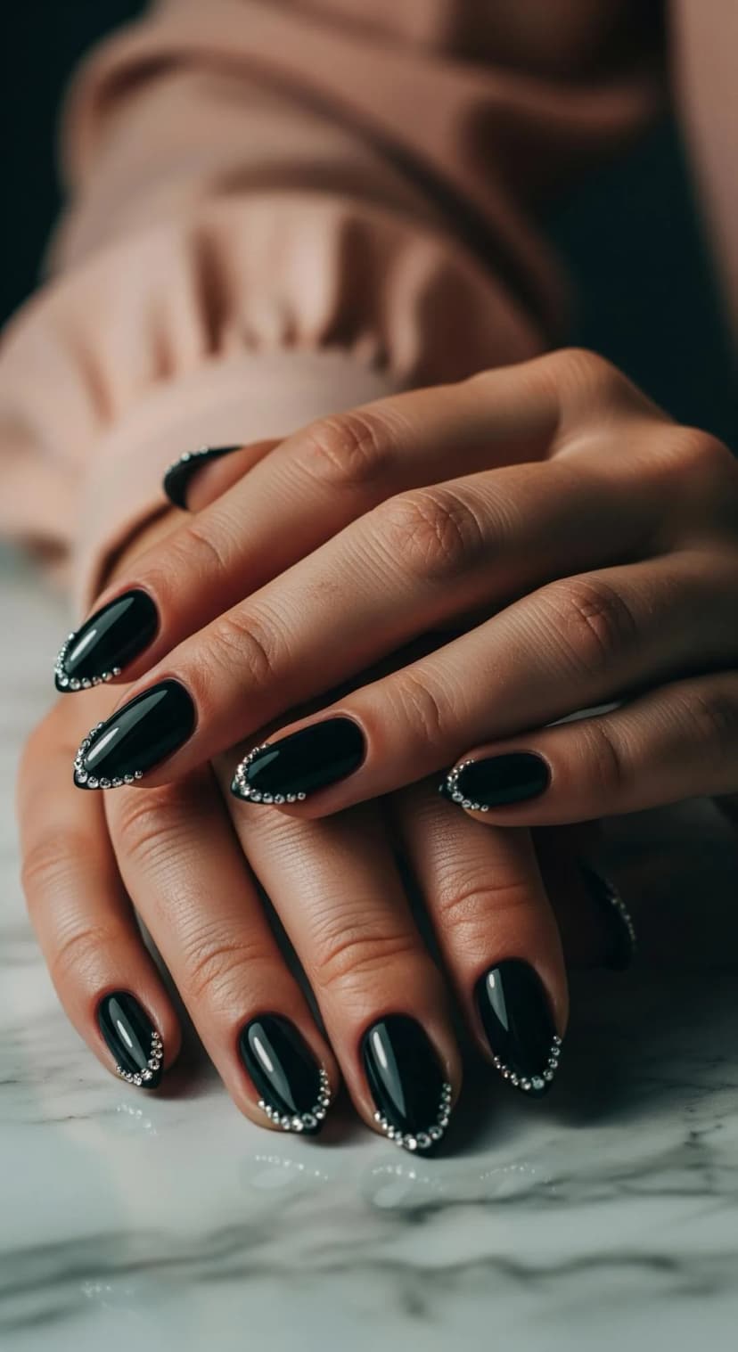 Glossy Black Gel Nails with Rhinestone Cuticle Accents