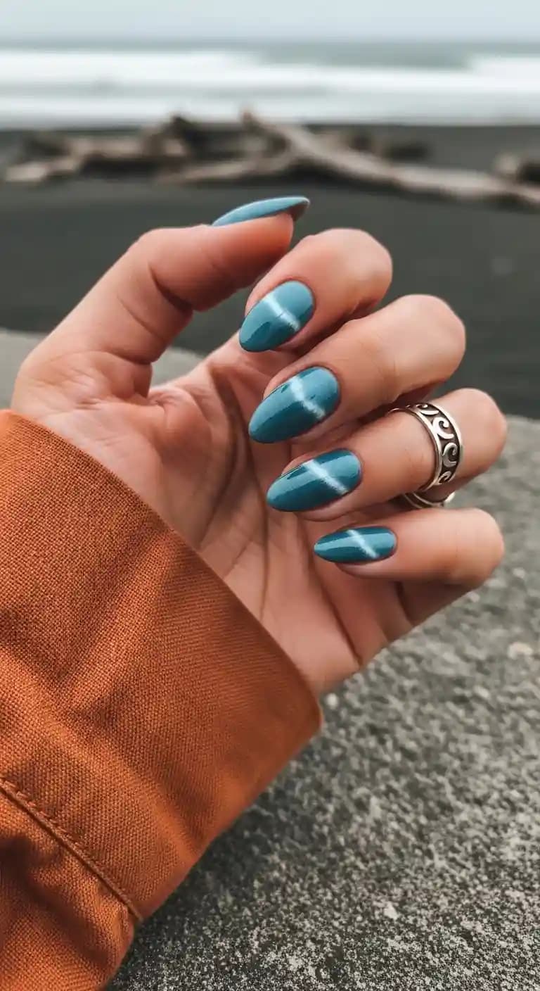 Teal Swirl Tie-Dye Almond Nails