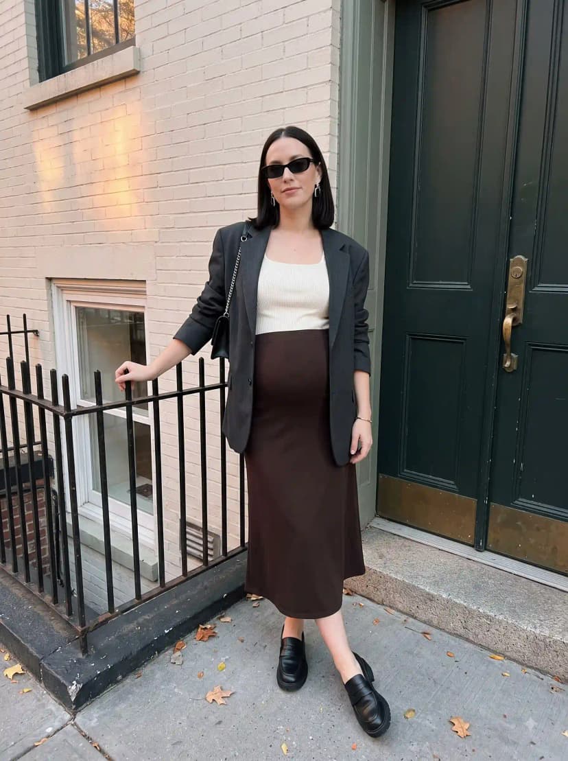 Grey blazer, white ribbed tank, brown satin midi skirt, and black loafers