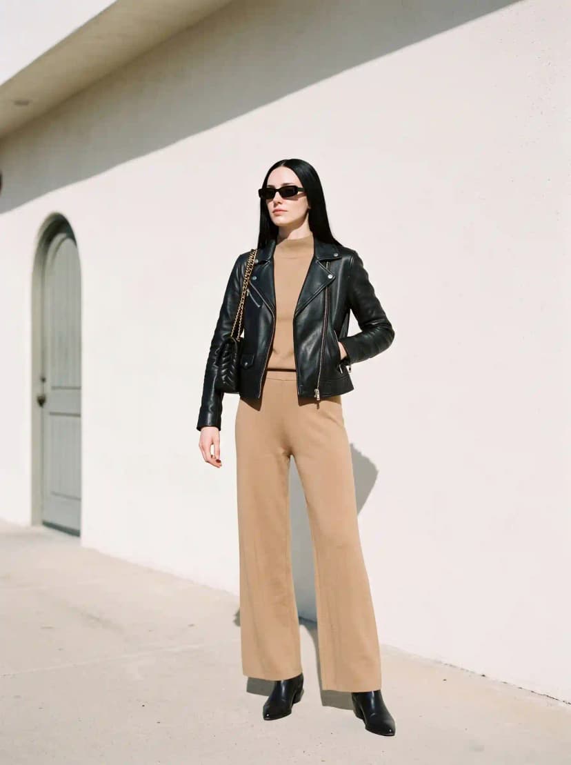 Black Leather Jacket + Camel Mock-Neck Sweater + Camel Wide-Leg Pants