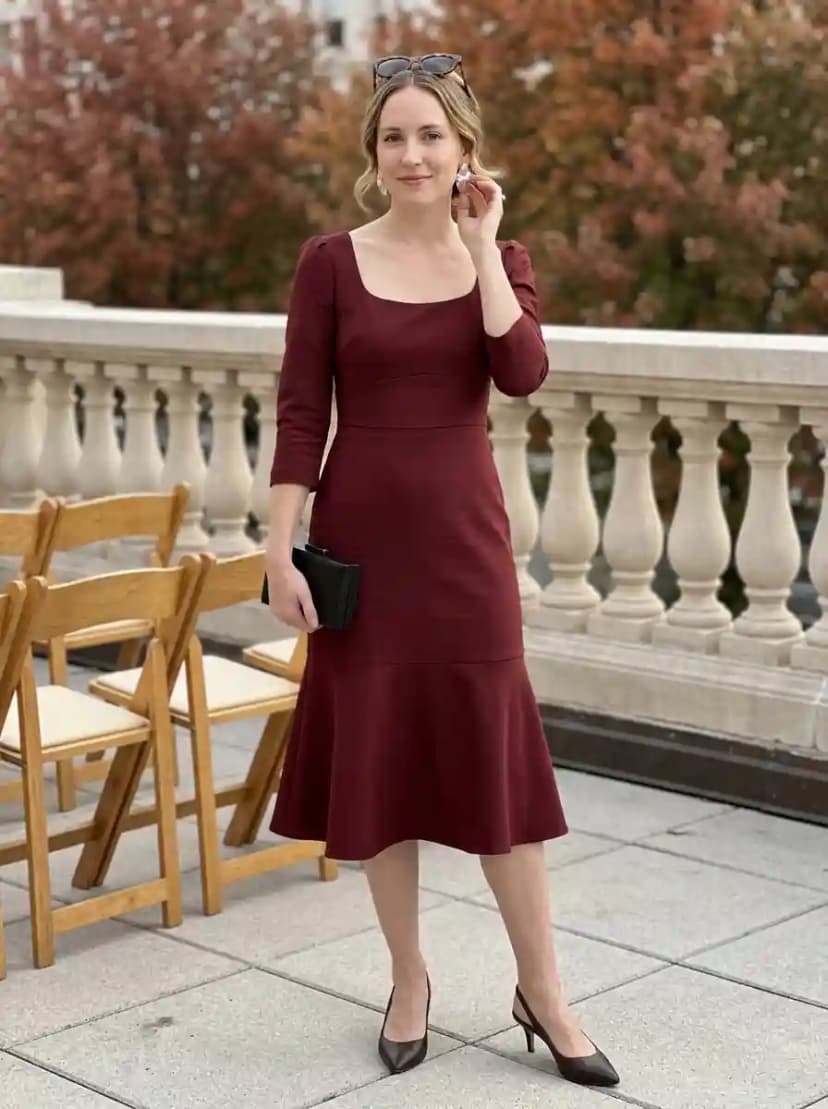 Deep burgundy scoop-neck midi dress with three-quarter puffed sleeves and flounce hem