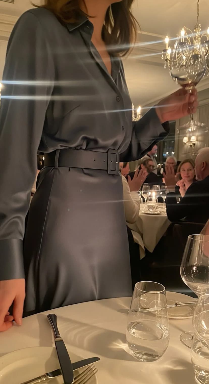 11. Silk Shirt Top Tucked into Midi Silk Skirt with Cut and Belt