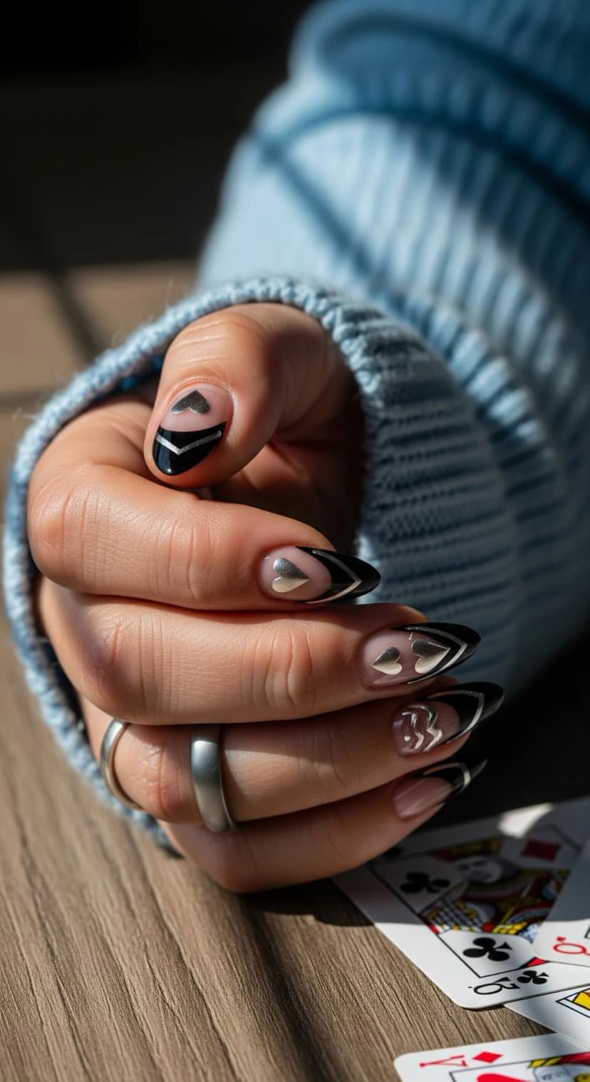 Black French Tip Nails with Silver Heart Accents