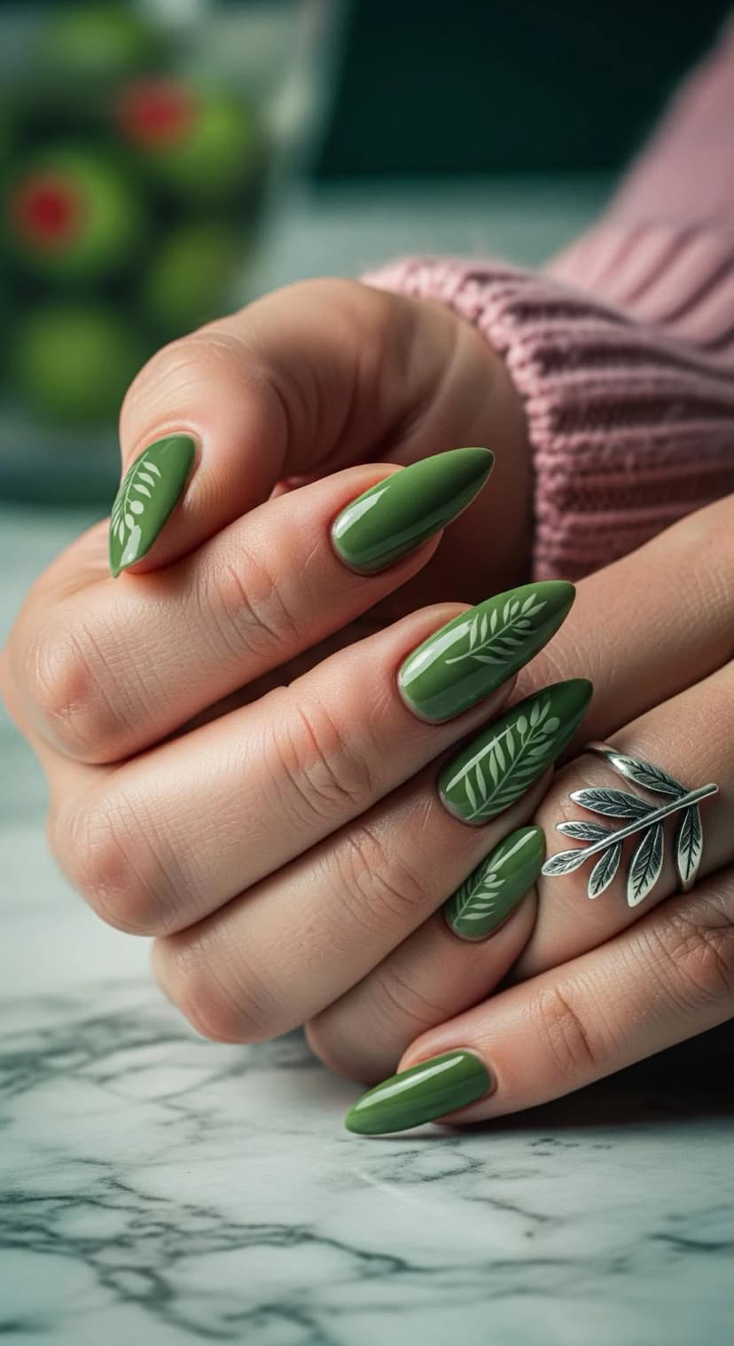 Olive Green Stiletto Nails with Delicate Leaf Design